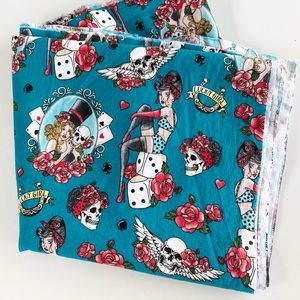 Lucky Girl Pinup Girl with Skulls Fabric Panel 2 yards by Fabric Traditions